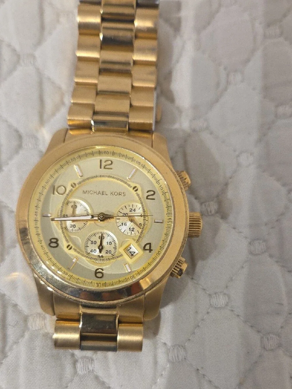 Michael Kors gold tone